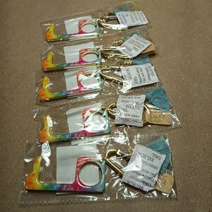 Safe Touch Tie Dye Keychain with Gold Accent tassle Karma